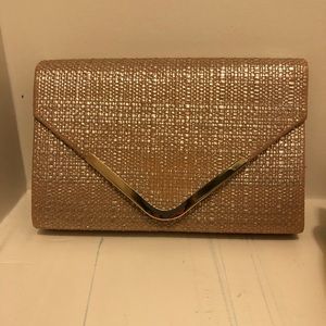 Basic evening clutch or shoulder bag.  Worn once , excellent condition